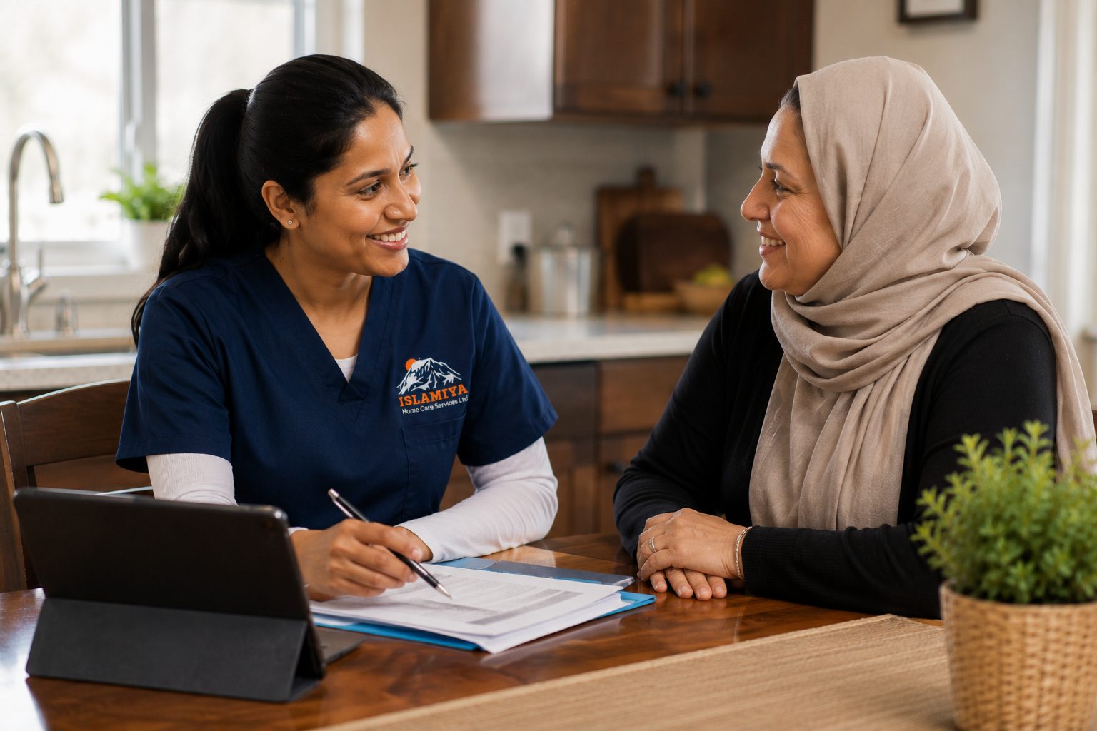 Caregiver having a warm conversation with a client's family